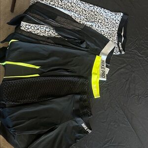 Nike Pro Black and Neon Yellow Leggings Collection
